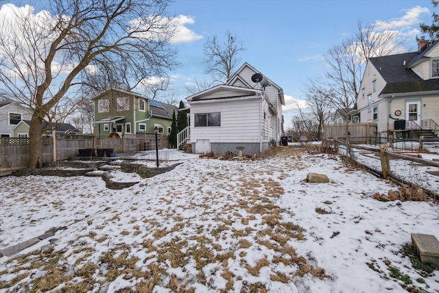 view of snow covered property