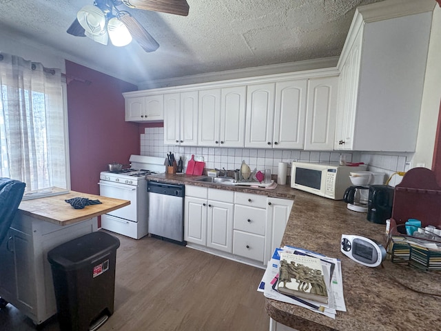 kitchen with white cabinetry, wooden counters, dark hardwood / wood-style flooring, white appliances, and decorative backsplash