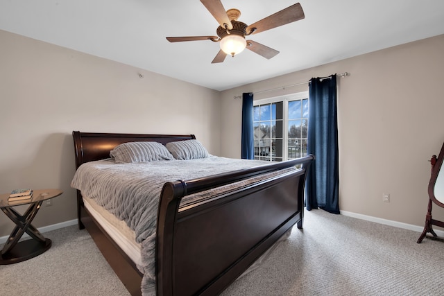 bedroom featuring ceiling fan and light colored carpet