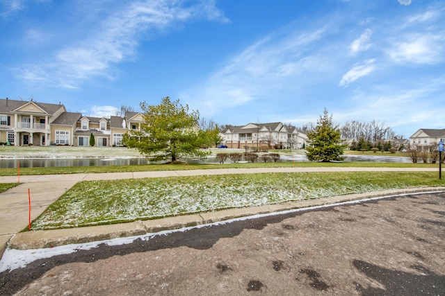 view of home's community featuring a water view