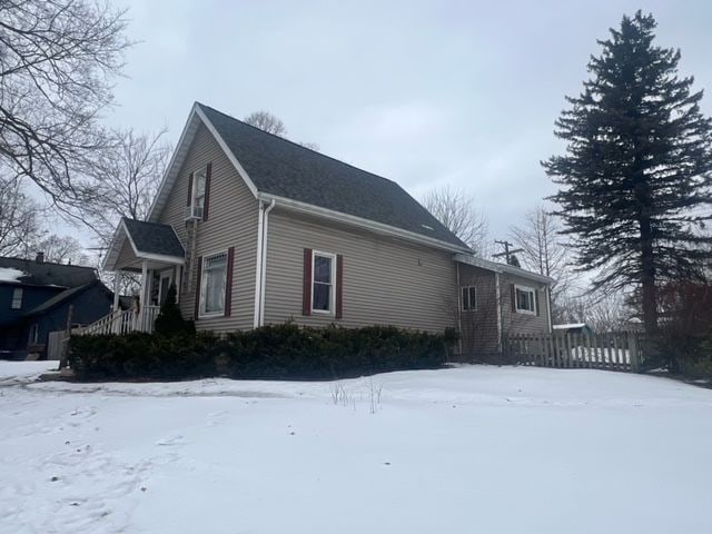 view of snow covered property