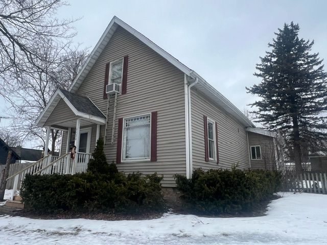 view of snow covered property