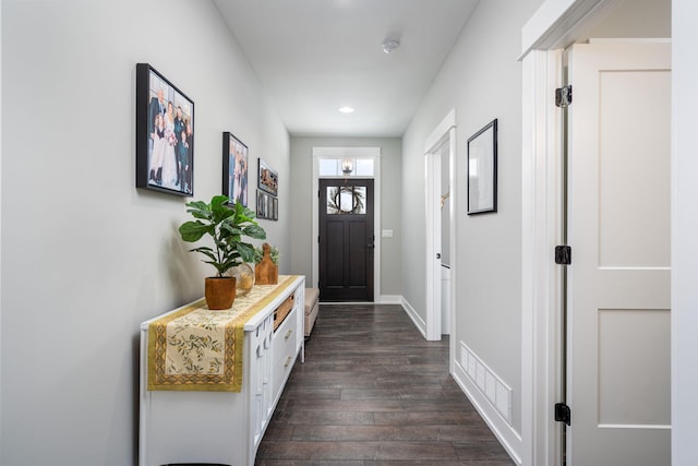 doorway featuring dark hardwood / wood-style floors