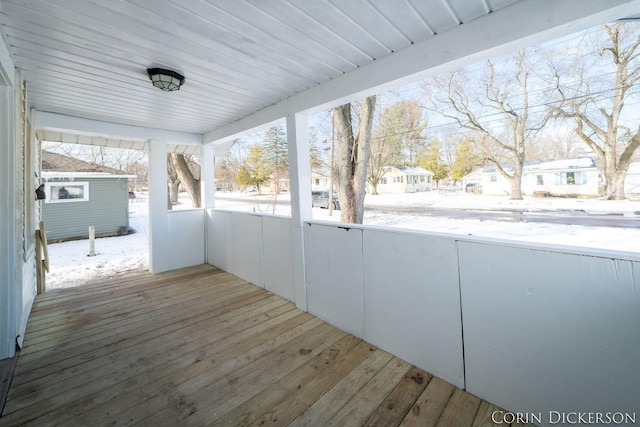 view of snow covered deck