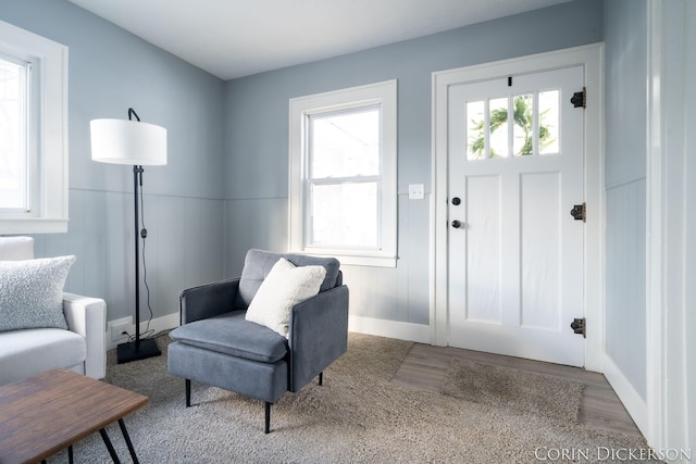 sitting room featuring hardwood / wood-style flooring