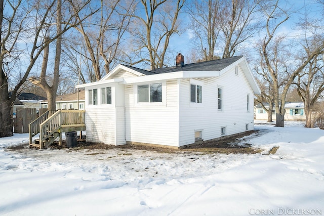 view of snow covered property