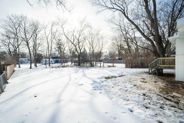 view of yard covered in snow