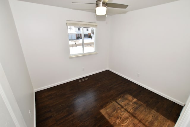 unfurnished room featuring ceiling fan and wood-type flooring