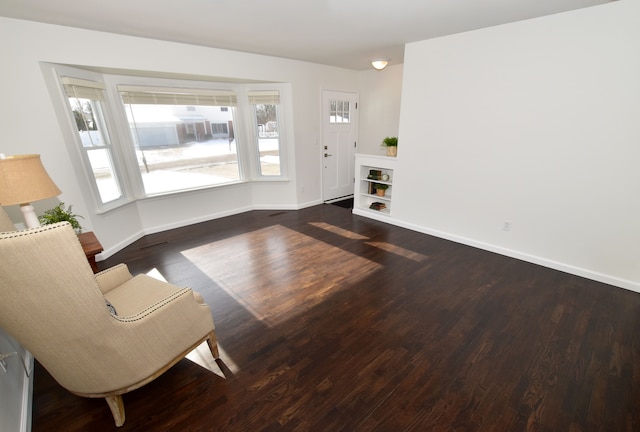 living room featuring dark hardwood / wood-style flooring