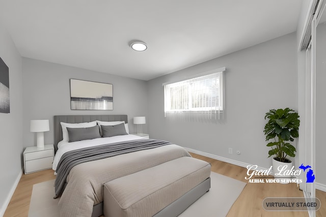 bedroom featuring light wood-type flooring