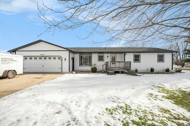 single story home featuring a garage