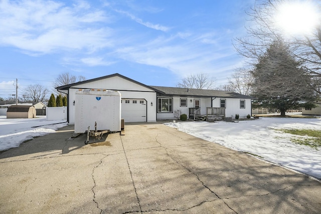 single story home featuring a garage