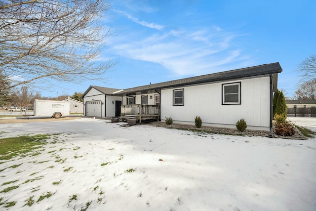 ranch-style home with a garage