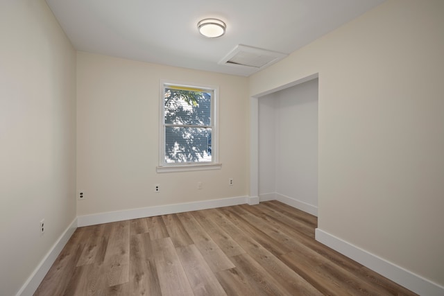 empty room featuring light hardwood / wood-style floors