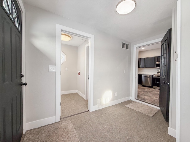 interior space featuring carpet flooring