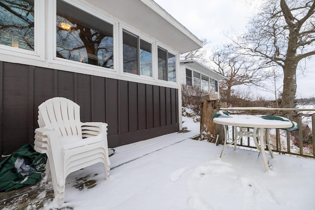 view of snow covered patio