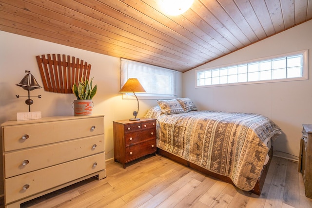 bedroom featuring wooden ceiling, lofted ceiling, and light wood-type flooring