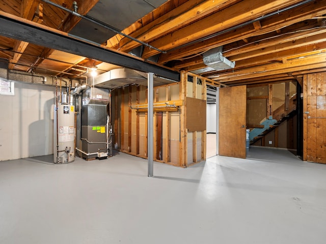 basement with heating unit and gas water heater