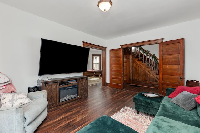 living room featuring dark hardwood / wood-style floors