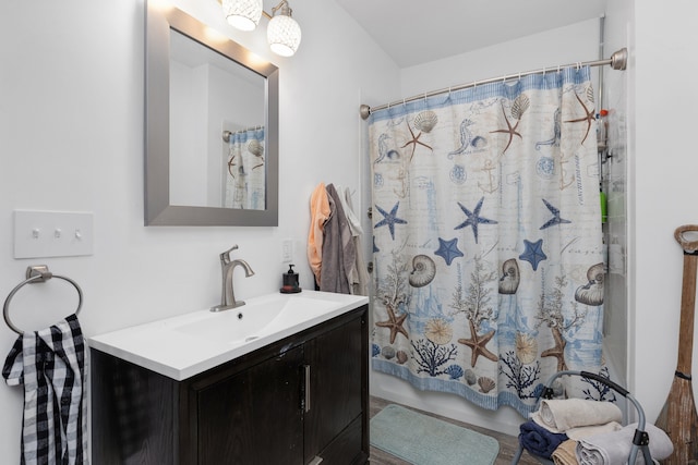 bathroom featuring vanity and walk in shower