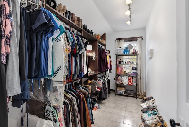 walk in closet featuring light tile patterned floors