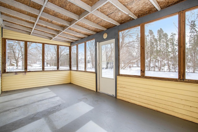 unfurnished sunroom featuring a wealth of natural light