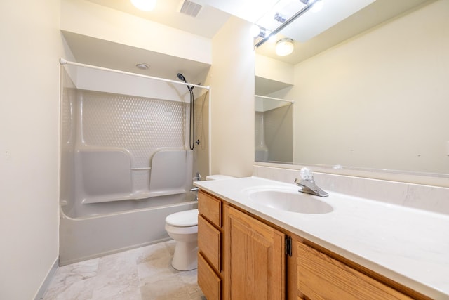 full bathroom featuring vanity, shower / tub combination, and toilet