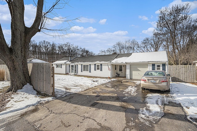 single story home with a garage