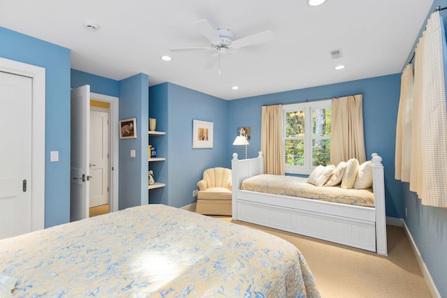 carpeted bedroom featuring ceiling fan