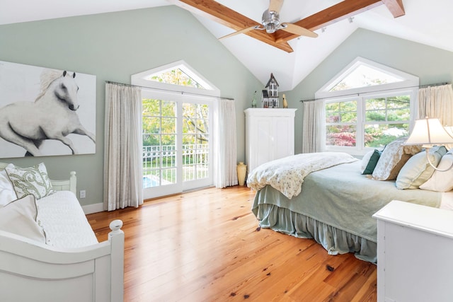 bedroom with access to outside, light hardwood / wood-style floors, lofted ceiling with beams, and ceiling fan