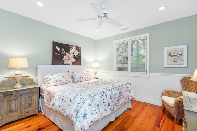 bedroom featuring ceiling fan and light wood-type flooring