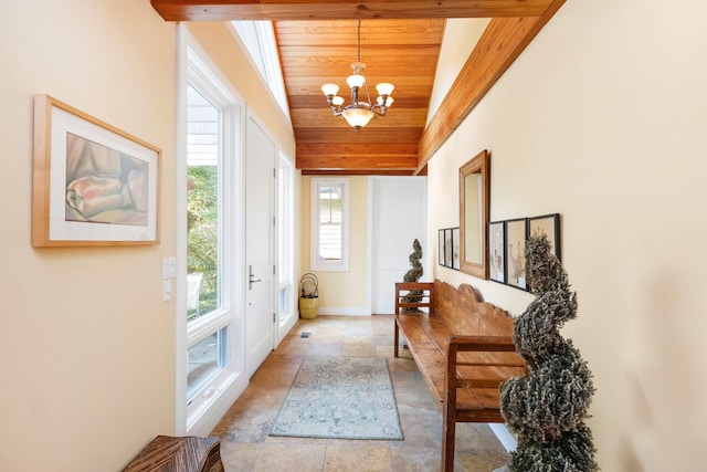 doorway featuring wood ceiling, vaulted ceiling, and an inviting chandelier