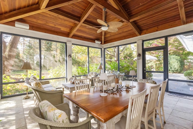 sunroom with beam ceiling, wood ceiling, and ceiling fan