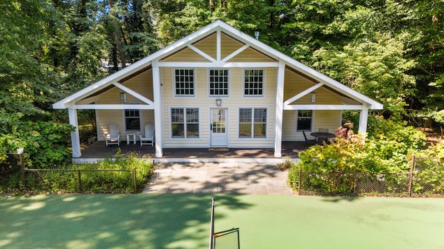 rear view of house featuring a patio