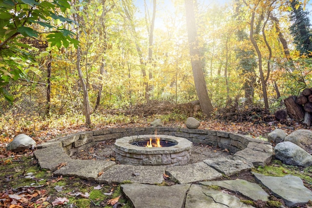 view of patio / terrace featuring an outdoor fire pit