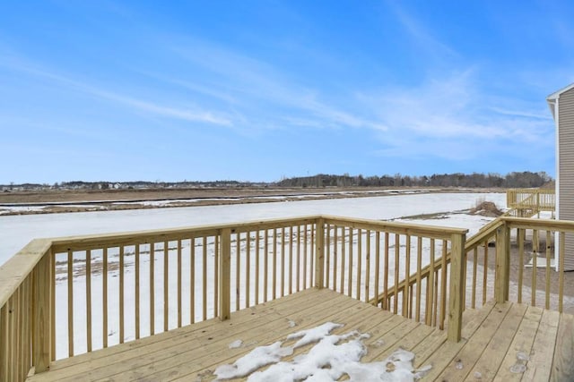 view of snow covered deck