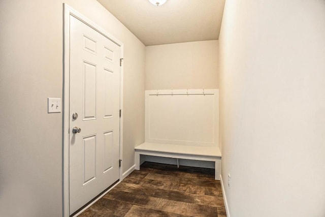 mudroom featuring dark wood-type flooring