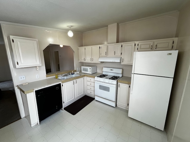 kitchen with sink, white cabinets, kitchen peninsula, crown molding, and white appliances