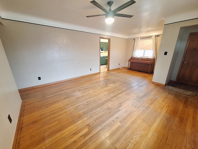 unfurnished bedroom featuring ceiling fan and light wood-type flooring