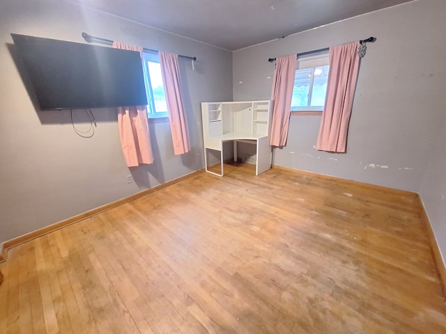 unfurnished bedroom featuring light hardwood / wood-style floors