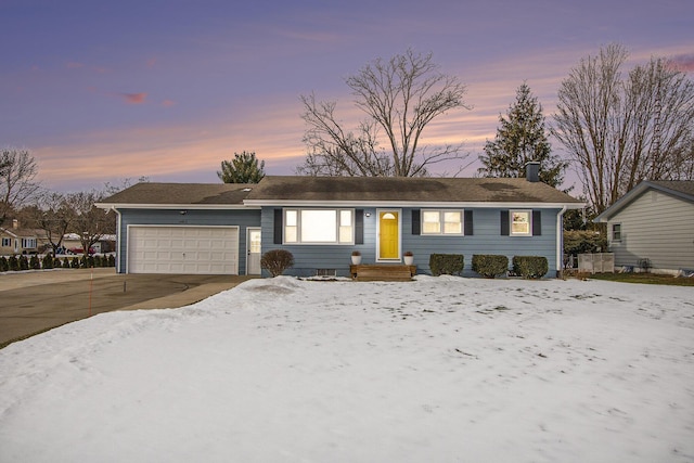 single story home with a garage