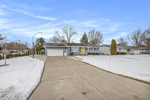 ranch-style home with a garage