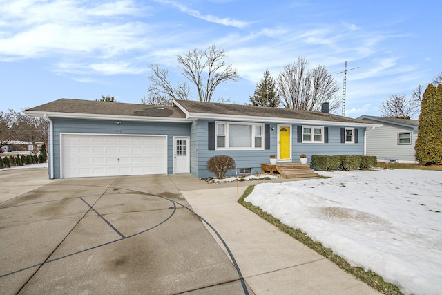 ranch-style house featuring a garage