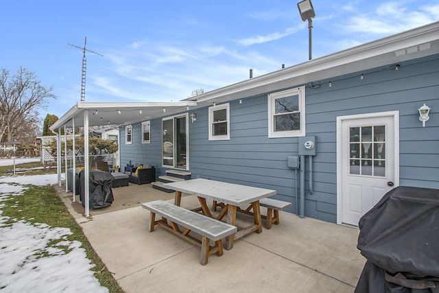 view of patio with a grill