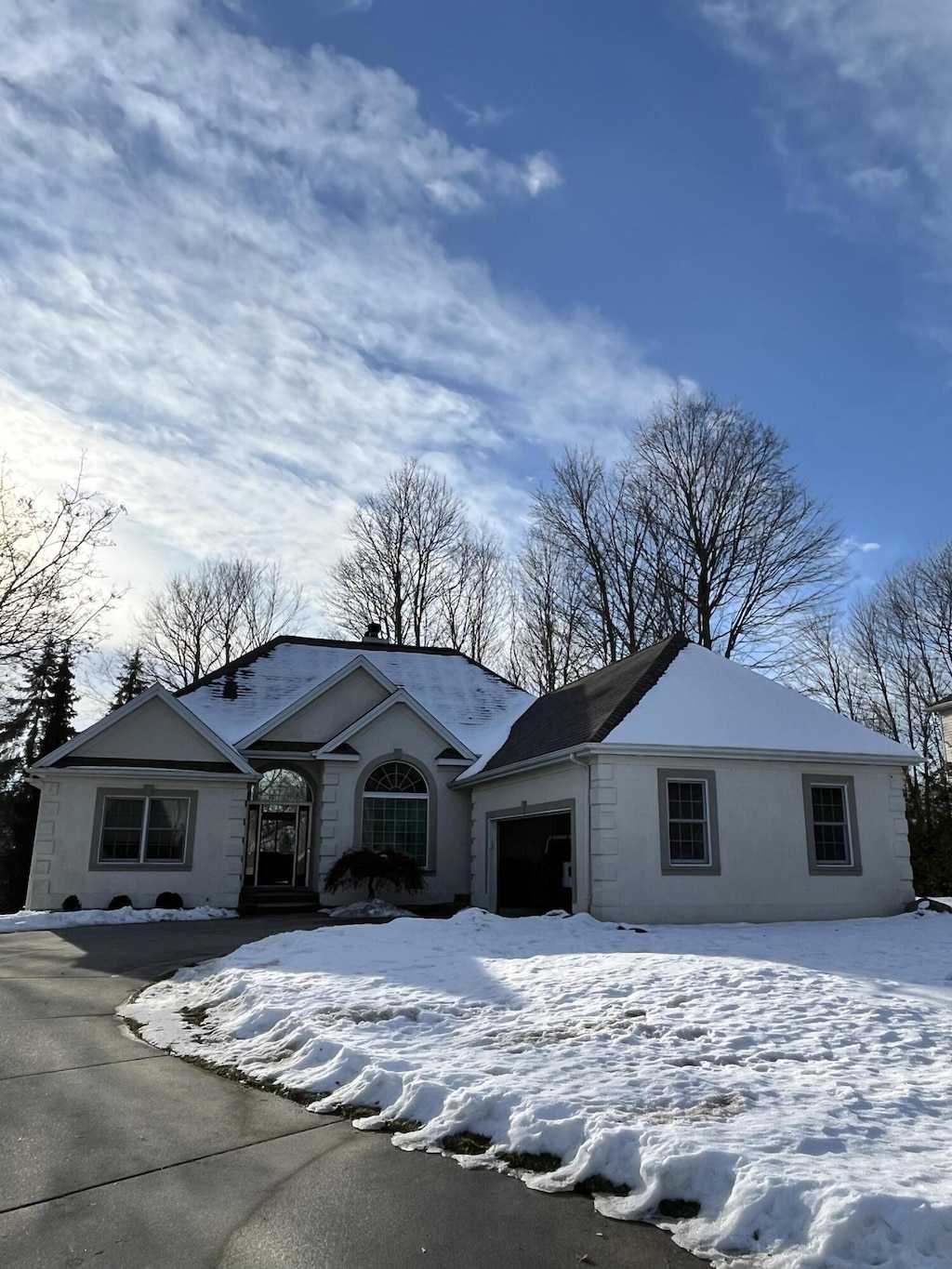 single story home with a garage