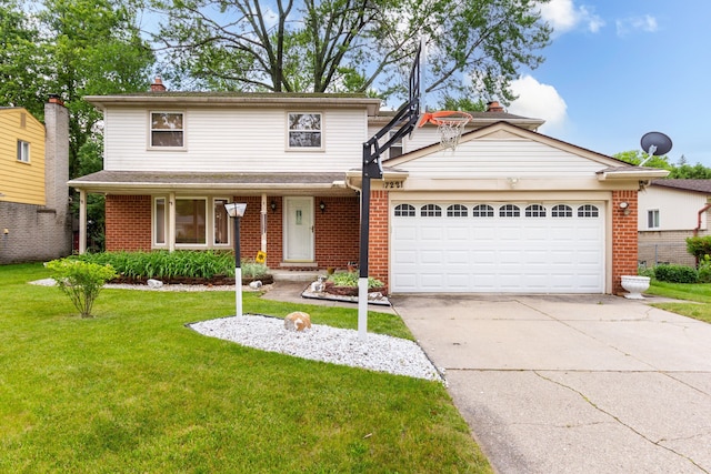 view of front property with a garage and a front lawn