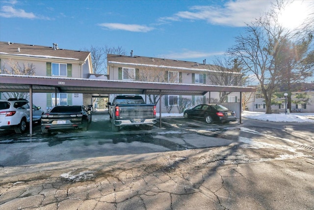 view of car parking featuring a carport