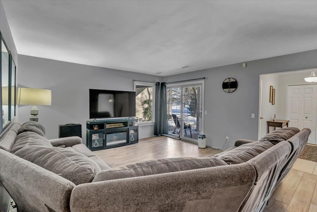 living room featuring light wood-type flooring