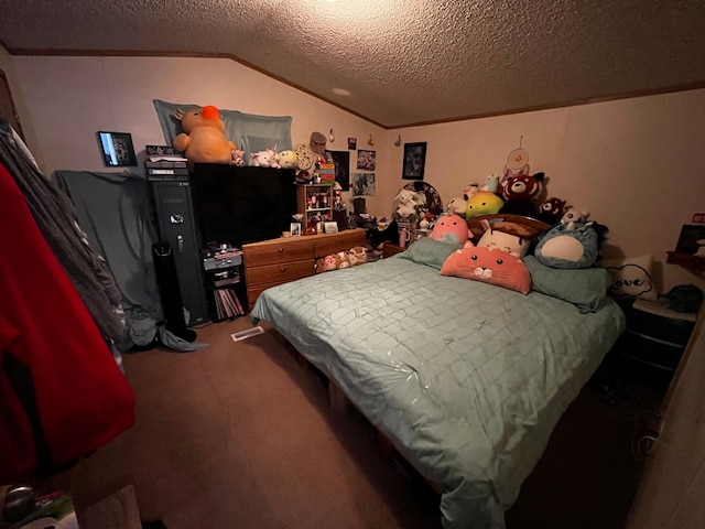 bedroom with lofted ceiling, a textured ceiling, and carpet flooring