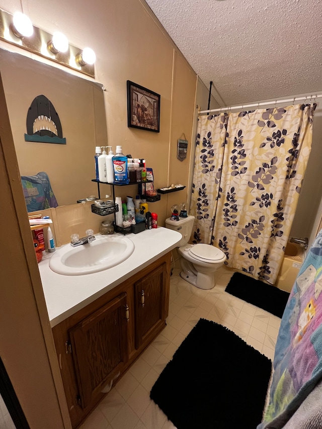 full bathroom featuring vanity, shower / bath combination with curtain, toilet, and a textured ceiling